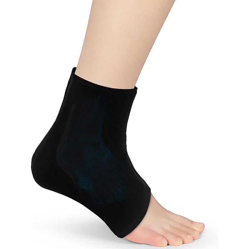 Black ankle support brace on a foot against a white background