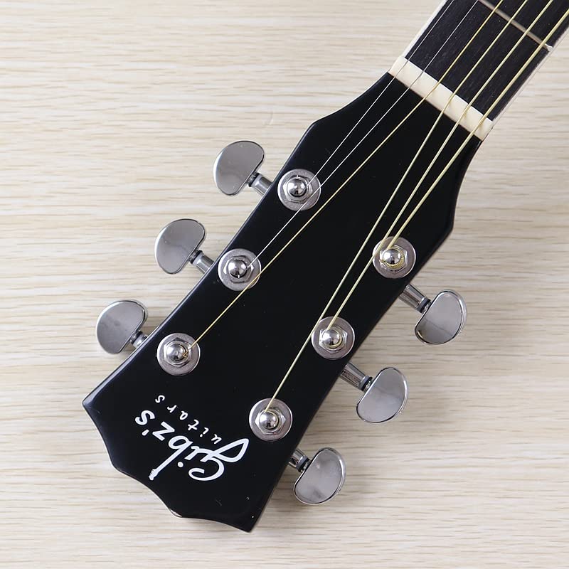 Full view of black acoustic guitar with cutaway