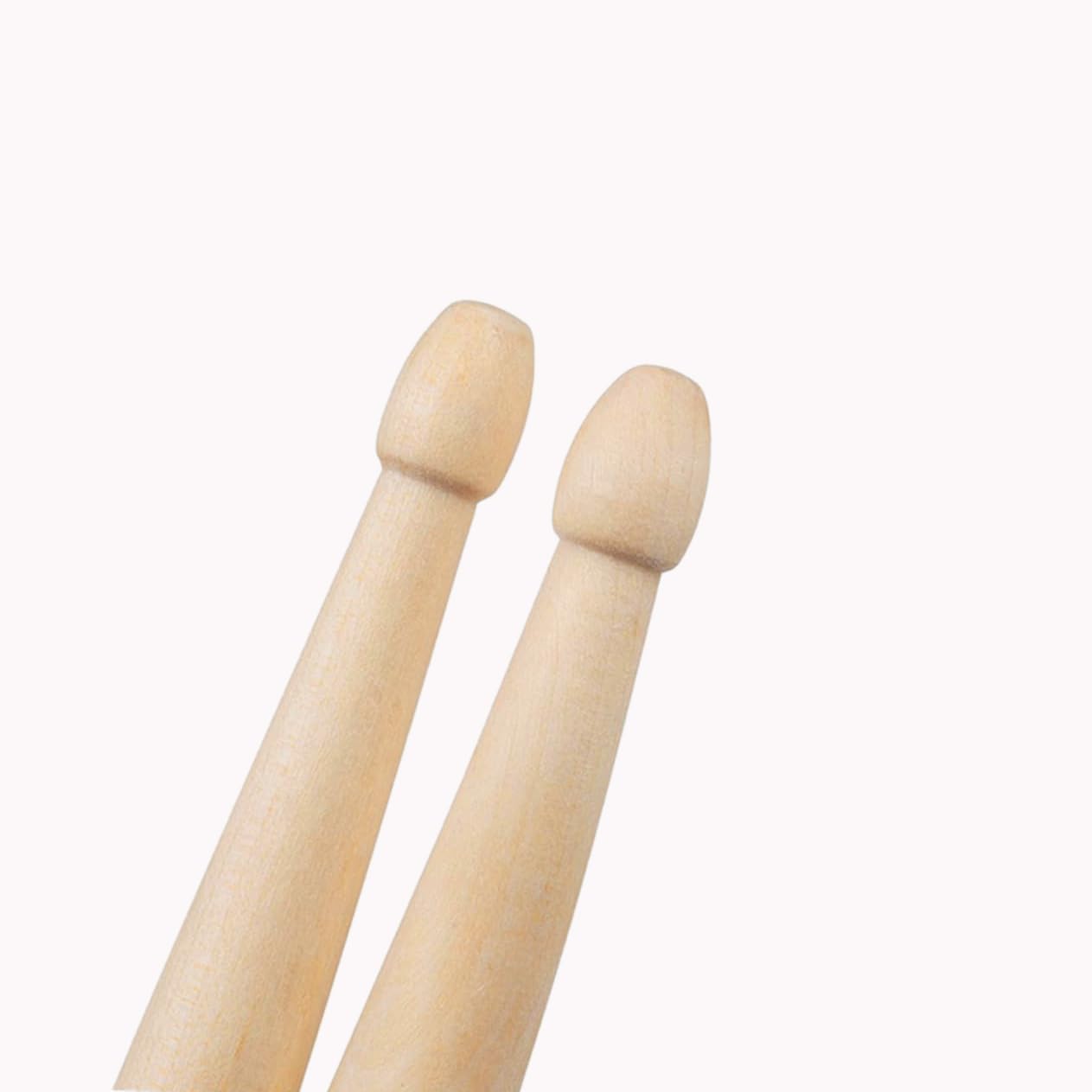 Two wooden drumsticks on a white background