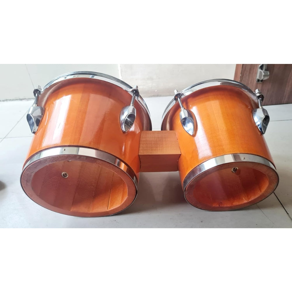 Side view of the orange bongo drum set showcasing glossy, handcrafted finish