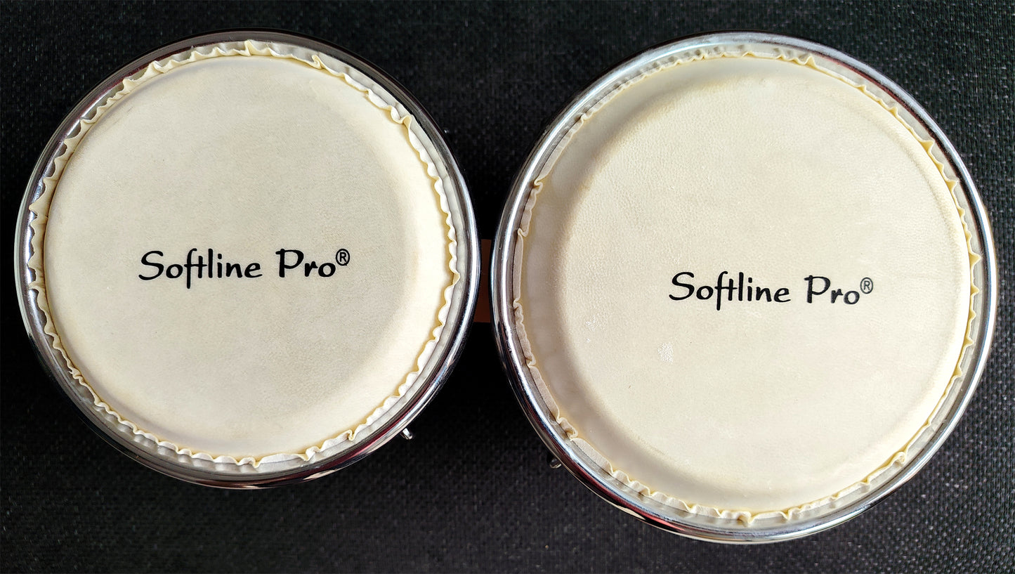 Close-up of hand-polished drum cavity interior showing smooth pinewood surface.