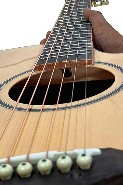 ide and rear silhouette of Gibz’s TG-40 Pro acoustic guitar highlighting body contours and finish