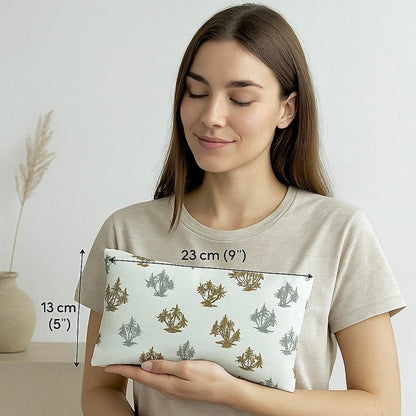 Woman holding a small pillow with measurements indicated