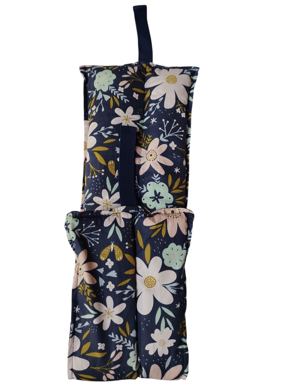 Floral-patterned bag with a strap on a white background