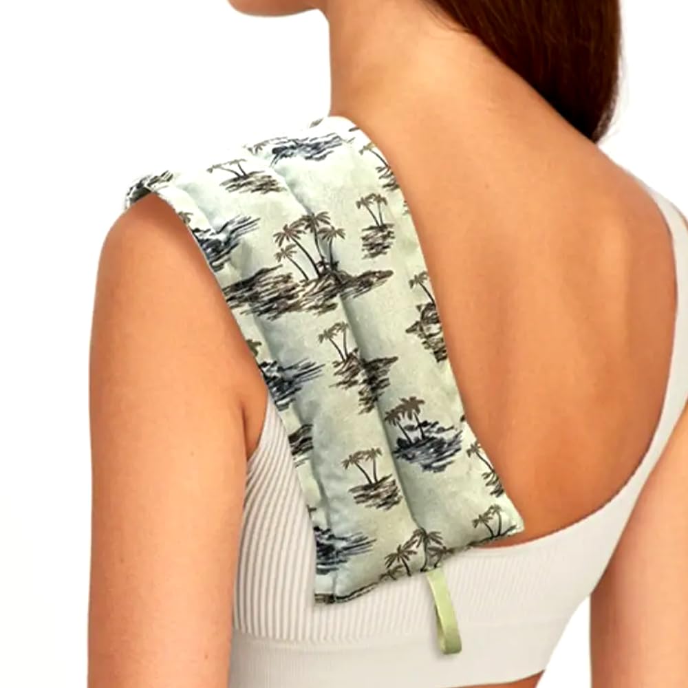 Person wearing a tropical patterned towel over one shoulder on a white background