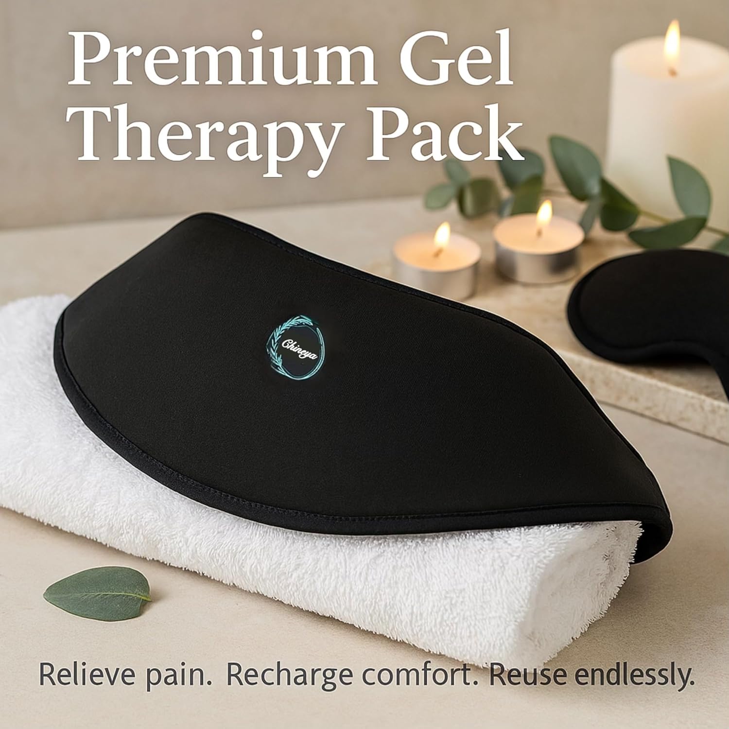 Black gel therapy pack on a white towel with candles and greenery in the background
