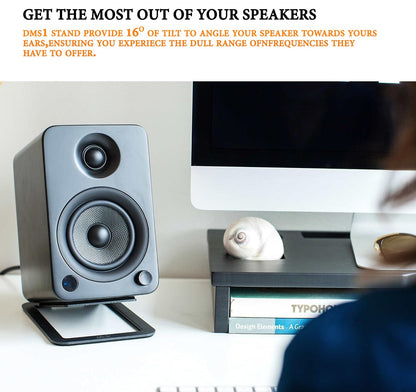 Side view of desktop speaker setup with SP DMS1 stand, 
Speaker stands with damping foam