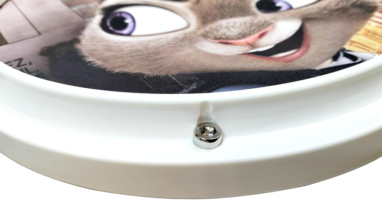 Side view of round silicone drum practice pad showing thickness