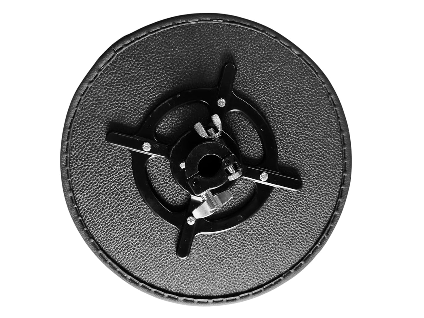 Round black object with central mechanism on a white background