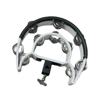Tambourine with metal jingles on a white background