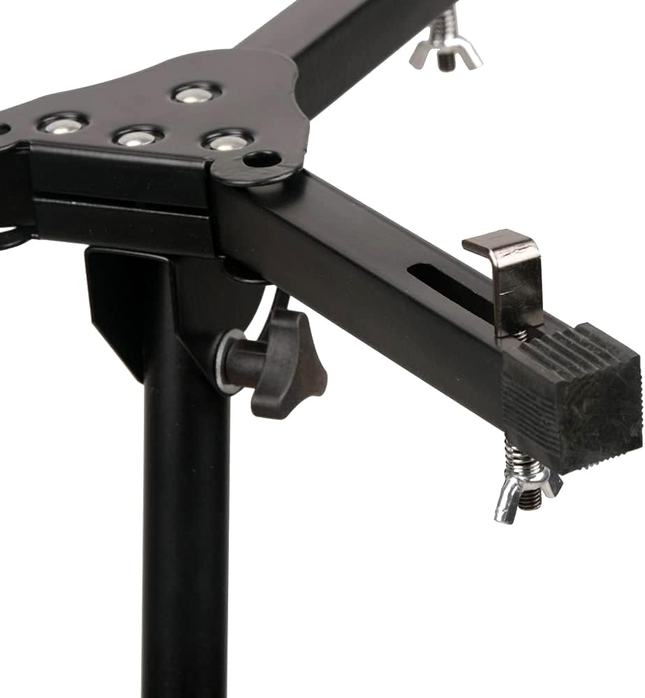 Close-up of a black metal stand with clamps on a white background