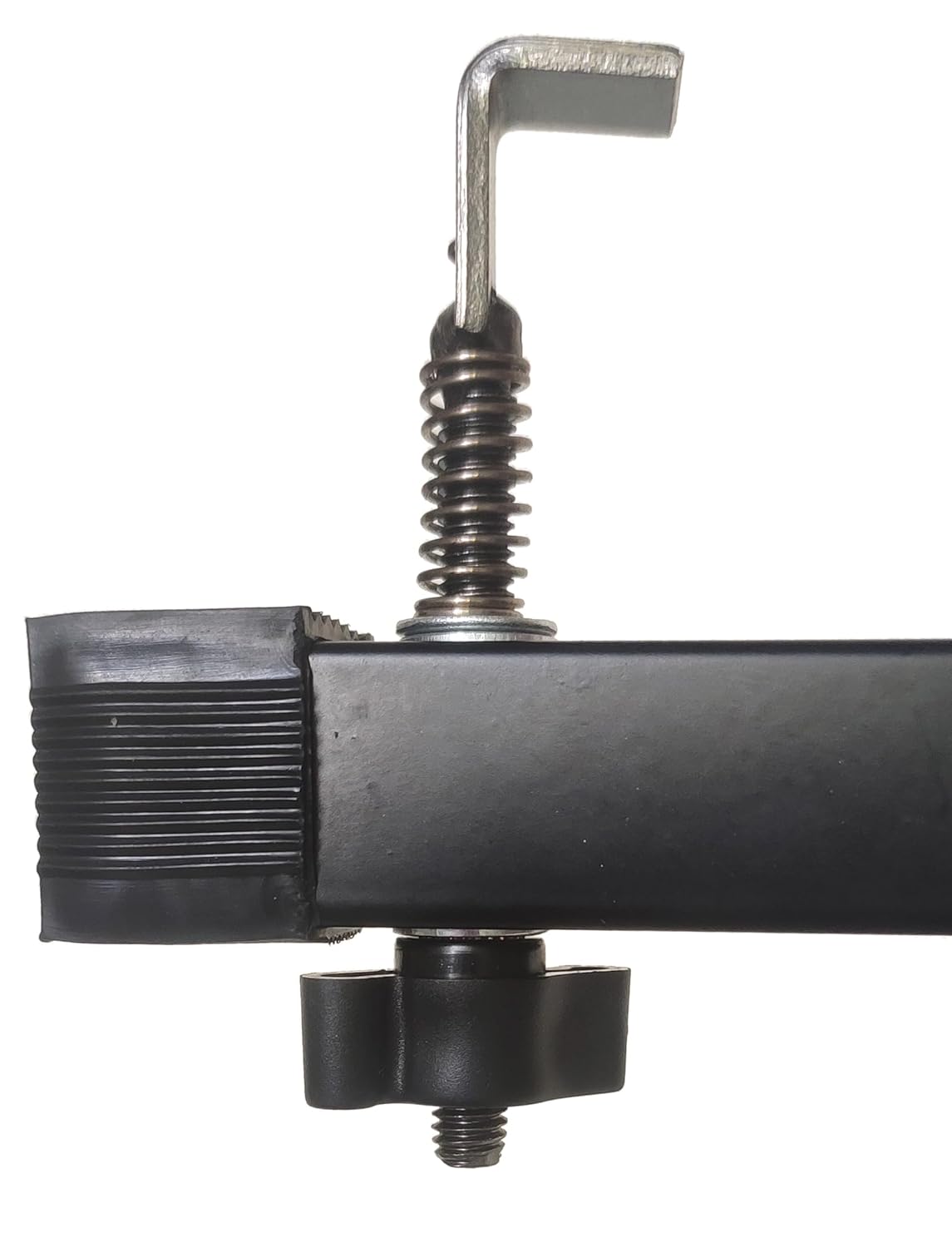 Mechanical component with a spring and metal lever on a white background